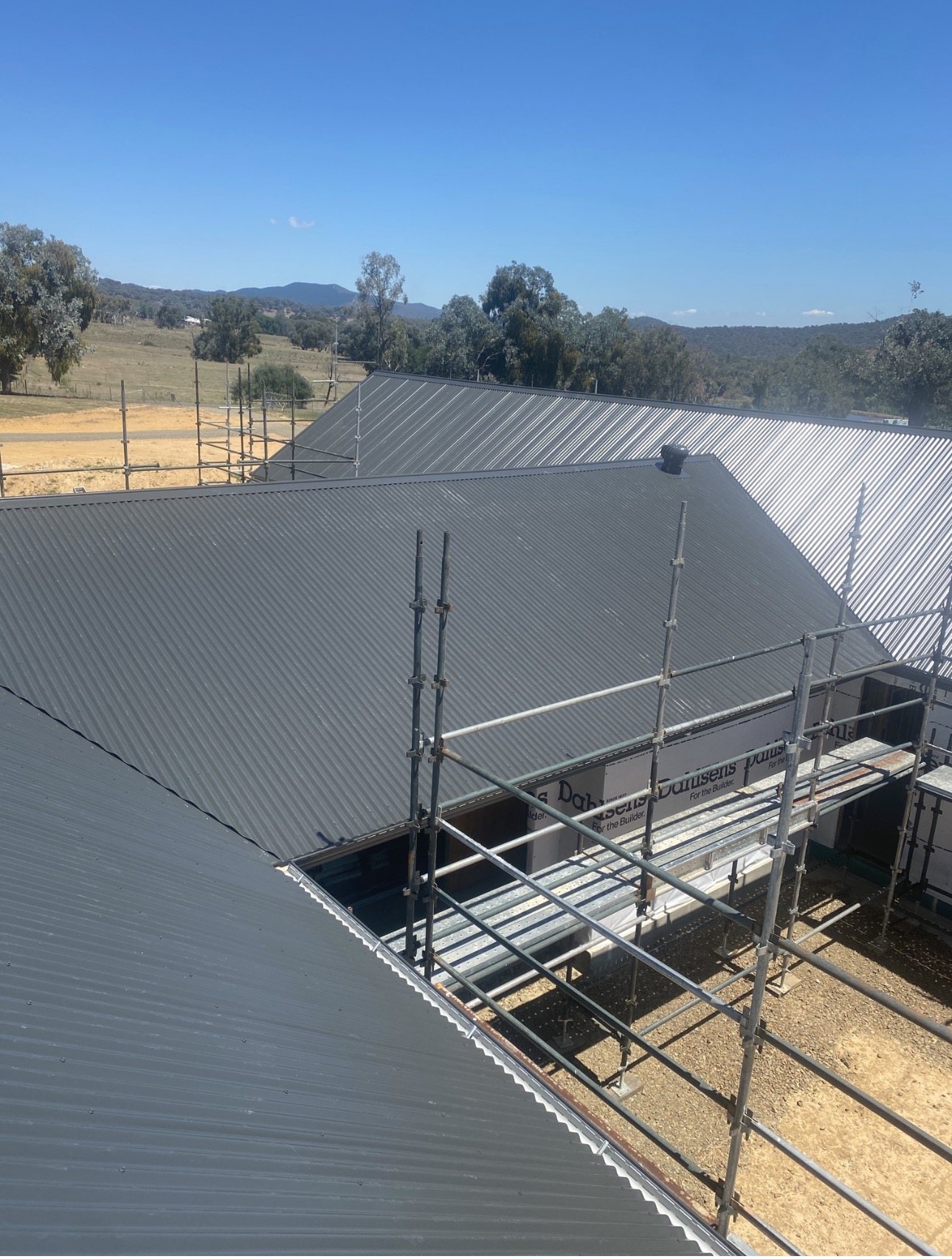 Skylight flashing on metal roof